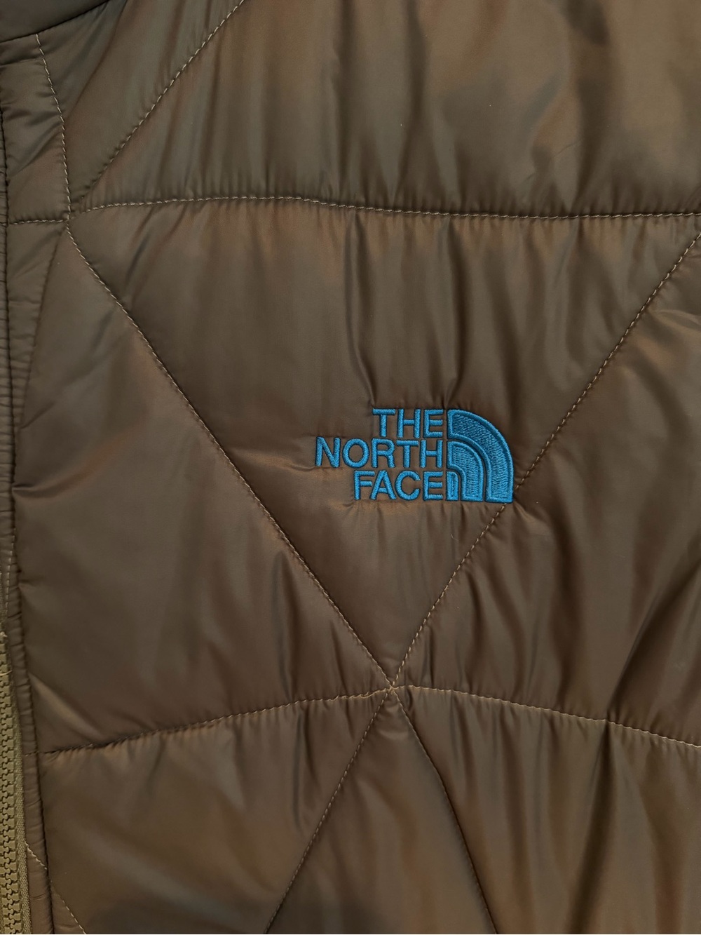 The North Face Men's Dark Gray Puffer Vest with Blue Accents - Picture 2 of 5